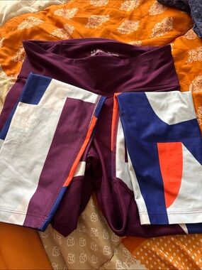 Under Armour Women’s Purple Bike Shorts with Blue & Orange Panels